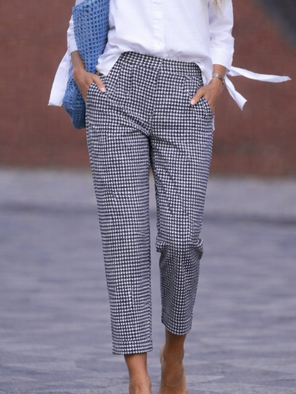 Chic black and white houndstooth lightweight pants, cuffed pant legs, ankle